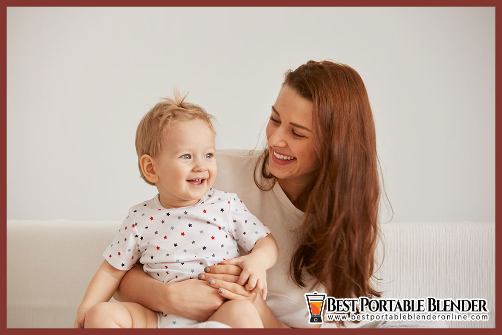 young-mom-holding-her-baby-in-her-lap